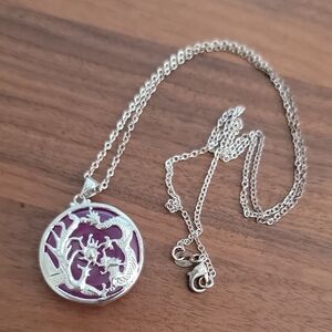 Reversible purple jade dragon and phoenix pendant with Silver Chain